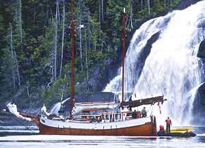 Duen sailing ship near waterfall