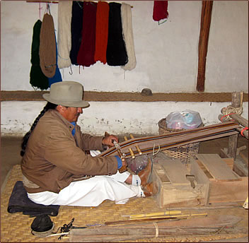 Backstrap weaving demonstration at Mindala Center for indigenous arts and crafts, Otavalo, Ecuador.