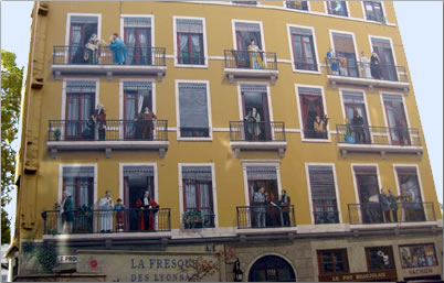 Murals on buildings in Lyon, France.
