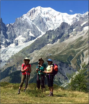 Three ladies trekking Mont Blanc, senior-friendly hiking in Europe.