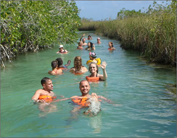 Swimming on the natural waterways and canals of Sian Kaan Biosphere Reserve.