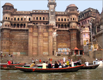 Varanasi pilgrims and tourists boating at Ganges River, India.