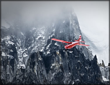 Wilderness photography: bush plane in Alaska Range.