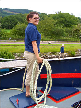 Scottish Highlander barge vacation hostess on deck.
