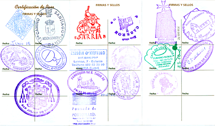Colorful stamps on a pilgrim passport.