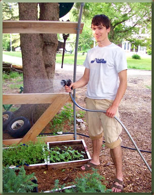 Brian Bender volunteers on organic vegetable farm in Vermont.